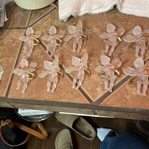 Set of 10 acrylic angel playing instruments ornaments.